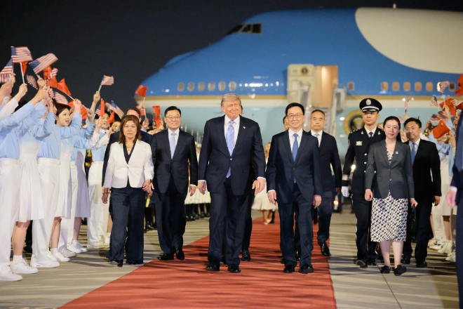 photo of Elite group of American CEOs – outgoing Apple CEO Cook among them – join President Trump in China image